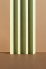Abstract beige and green background for the presentation of a cosmetic product. Empty scene with a geometric backdrop. Podium for product promotion, beauty, natural eco cosmetic.