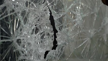 breaking glass with a hammer in slow motion - Powered by Adobe