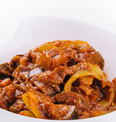 Stewed zucchini with tomatoes and peppers
