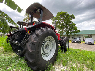 Newly issued Farm tractor in a university parking facility