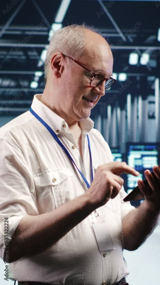 Aufkleber vertical video older professional navigating network of server rigs in industrial cloud computing bu
