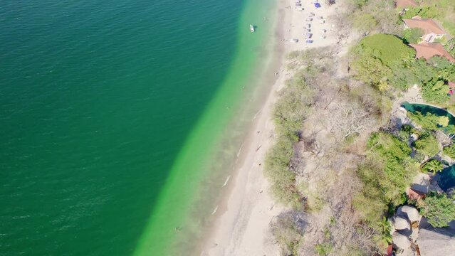 Aerial Drone Flight Over White Sand And Turquoise Water Of Conchal Beach, Costa Rica, 4K