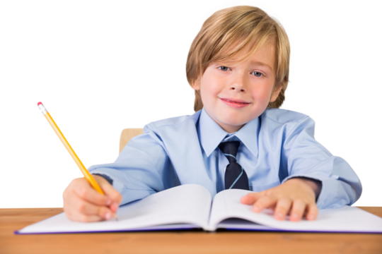 Digital png photo of caucasian schoolboy writing in notebook on transparent background