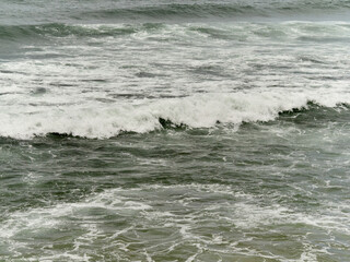 Photographs of waves on a city beach. Gijón. Asturias. Spain. 