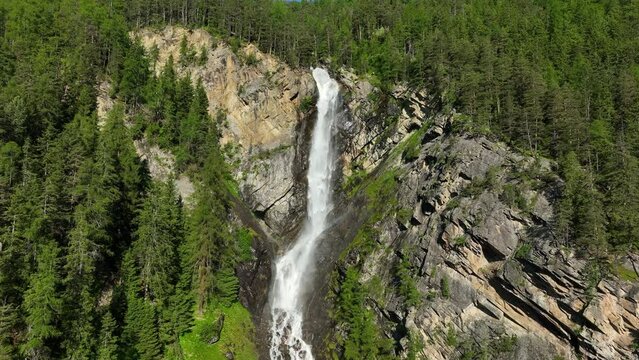 Lehner Wasserfall waterfall in the Ötztal valley in Tyrol Austria during a beautiful springtime day in the Alps.