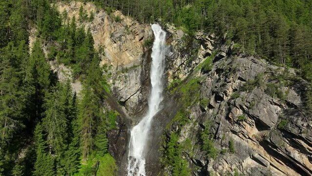 Lehner Wasserfall waterfall in the �tztal valley in Tyrol Austria during a beautiful springtime day in the Alps.