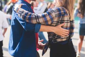 Couples dancing traditional latin argentinian dance milonga outdoor in the city streets, tango salsa bachata kizomba lesson, outdoors dance school class festival in a summer sunny day