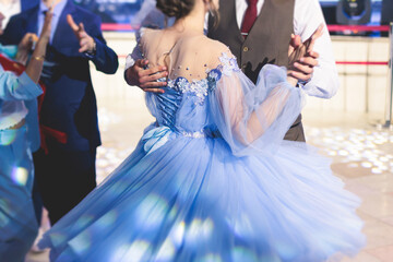 High school graduates dancing waltz and classical ball dance in dresses and suits on school prom graduation, classical ballroom dancers dancing, waltz, couples quadrille and polonaise