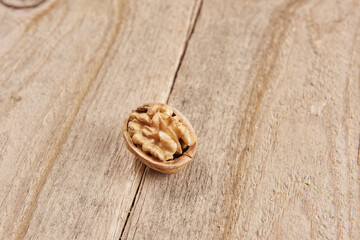 Delicious nuts and dry fruits on the background, close up style, in the plate still life.