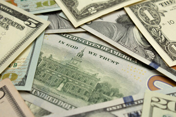 Background with cash US banknotes. Cash money of USA to buy gift. 100 USD. Dollar closeup. Concept of immigration, currency exchange, buying citizenship, tourism, travel. Repayment of debt. Bill. Tax