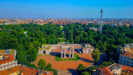 Gate Sempione Porta Sempione city gate to Lombardy in the fall. Arch of Peace. Arco della pace. sunny evening in milan city park aerial panorama 4k italy milano city triumphal arch. Sculptures