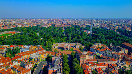 Gate Sempione Porta Sempione city gate to Lombardy in the fall. Arch of Peace. Arco della pace. sunny evening in milan city park aerial panorama 4k italy milano city triumphal arch. Sculptures - obrazy, fototapety, plakaty