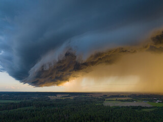 Naklejka na ściany i meble Giant thunderstorm clouds with supercell wall cloud, summer, Lithuania