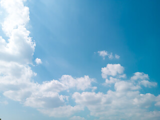 background of soft white clouds with blue sky in spring. heaven life. such as calm and relaxation. focus on clouds