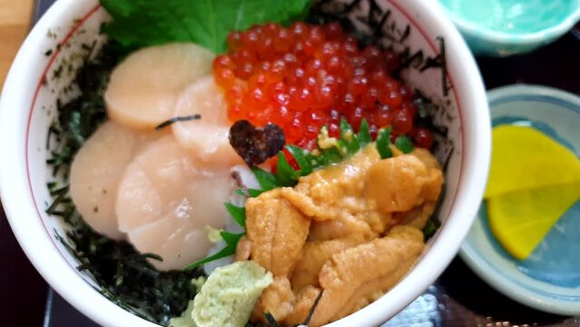 Japanese seafood don ikura hotate uni over rice Hokkaido fresh food