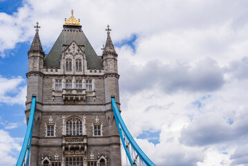 Fototapeta na wymiar Under Iconic Tower Bridge connecting London with Southwark on the Thames River UK beautiful English symbols Sunny day wallpaper travel