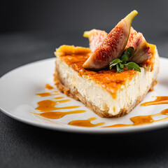 cheesecake figs slices sweet cake dessert healthy meal food snack on the table copy space food background rustic top view