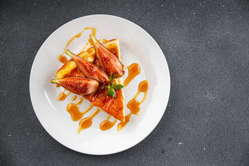 cheesecake figs slices sweet cake dessert healthy meal food snack on the table copy space food background rustic top view