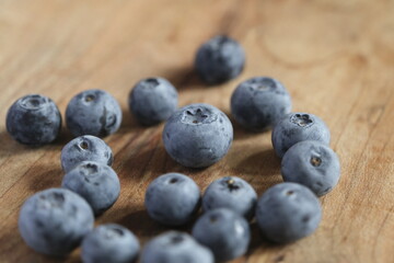 blueberries on wooden background