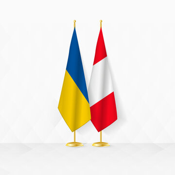 Ukraine and Peru flags on flag stand, illustration for diplomacy and other meeting between Ukraine and Peru.