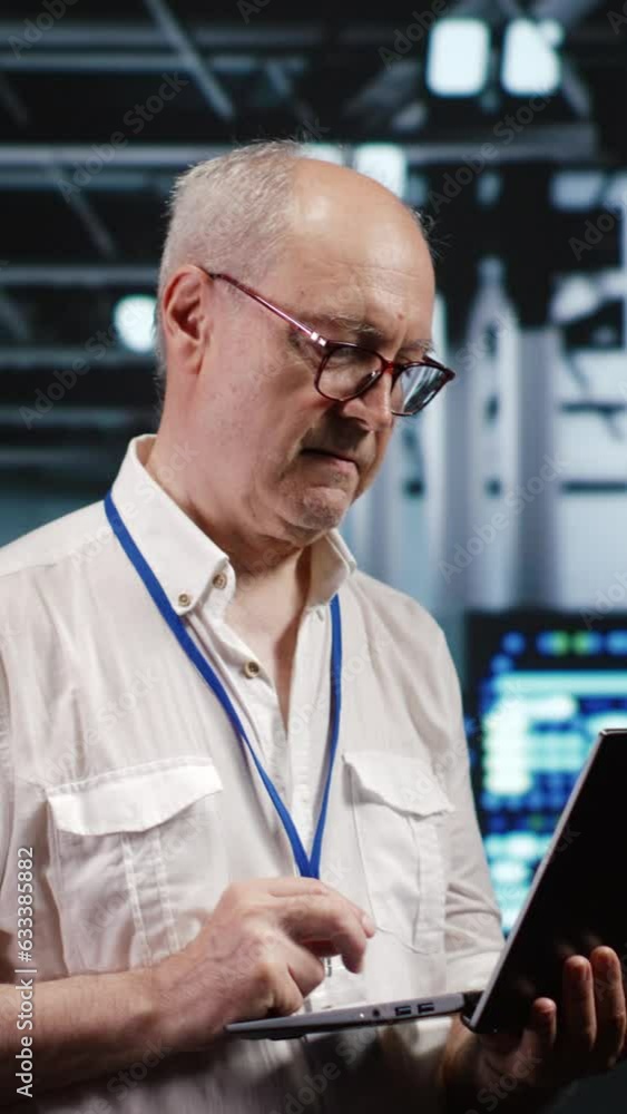 Aufkleber vertical video expert it professional navigating network of servers in industrial workplace. technic