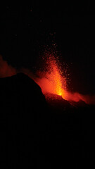 View on erupting Stromboli volcano, by night, on august  2023