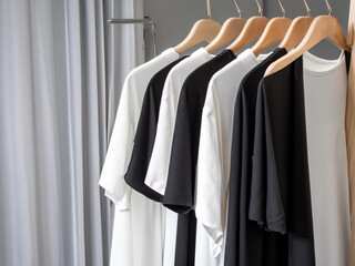 Realistic tshirt mockup | Blank black and white t-shirt on hanger, design mockup. Clear plain cotton tshirt mock up template. Apparel store logo mock branding display