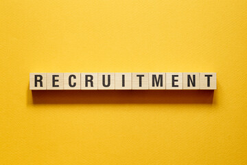 Recruitment - word concept on building blocks, text