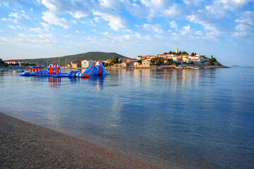 View of Primosten, Croatia. Dalmatian coast. Summer view of Primosten town.