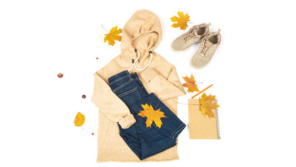Autumn comes. Fashionable women's clothing autumn outfit. Creative Flatlay Autumn Accessories Design.