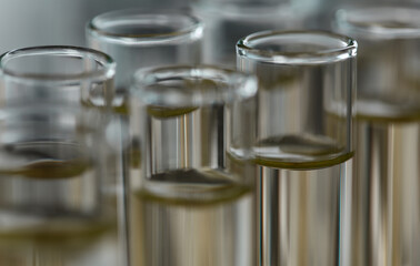 Yellow liquid spilled petrol additive innovative supply. Conveyor line production household cleaning products detergents help cleaning destruction stains pests urine poison antidote vaccine concept.