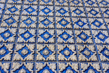 famous close up white and blue azulejo tiles in porto Portugal