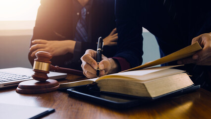 Businessman and Male lawyer or judge consult having team meeting with client, Law and Legal services concept.