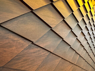 Brown wooden wall with a diamond pattern on the sides.