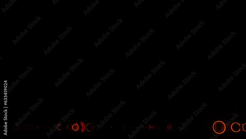 Aufkleber rows of different rings flashing in red-orange on a black background. looped animation. 3d render