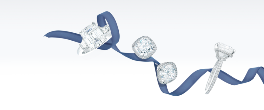 diamond jewelry floating on ribbon