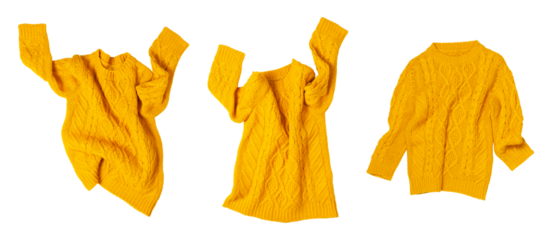 Cut out yellow orange flying women's autumn knitted sweater isolated on white background. With clipping path. Clothing concept, trendy fall winter cozy sweater pullover jersey