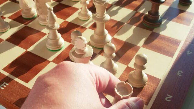 Short castling of the chess rook and king by the hand of the male player during the game, slow motion