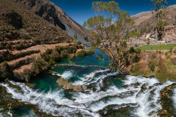 Panoramic view of the river and water falls in Huancaya, Yauyos, Peru