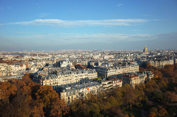Fototapeta na wymiar Paris cityscape panorama view from Eiffel Tower, Fall season sunny day blue sky unfiltered photo