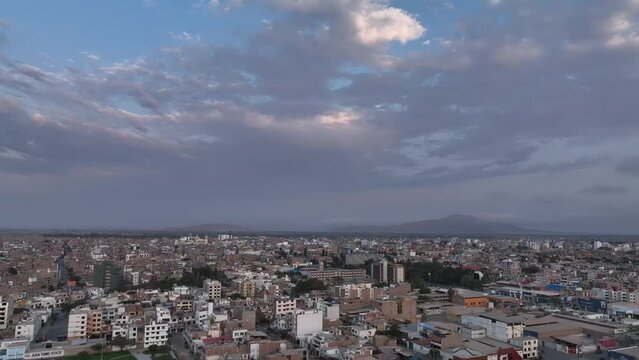 Chiclayo city sunset buildings houses all around the city. Developing city in the north of Peru.