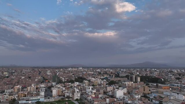 Chiclayo city sunset buildings houses all around the city. Developing city in the north of Peru.