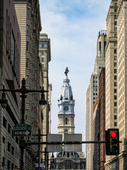 Philadelphia City Hall Clock Tower with building and street lights