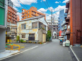 City of Tokyo. Japanese architecture. Residential area in Tokyo. Empty road. Cityscape of Tokyo. Tourism in Japan. Panel buildings in Japan. Regions of asia. Japan cityscape on sunny day
