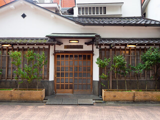 City of Tokyo. Japan architecture. Single storey building in asian style. Private house in Tokyo. Japanese building with beautiful doors and windows. Asian architecture. Modern mansion in Japan style
