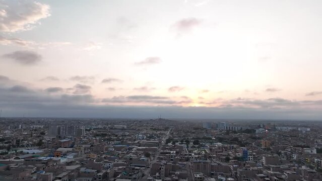 Chiclayo city sunset buildings houses all around the city. Developing city in the north of Peru.