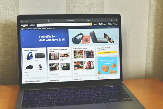 Laptop with Amazon Homepage on Screen for E-Commerce