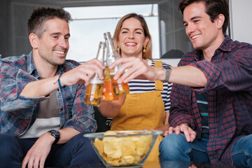 Group of friends toasting together and smiling in a fun plan. Concept: lifestyle, friendship, toast