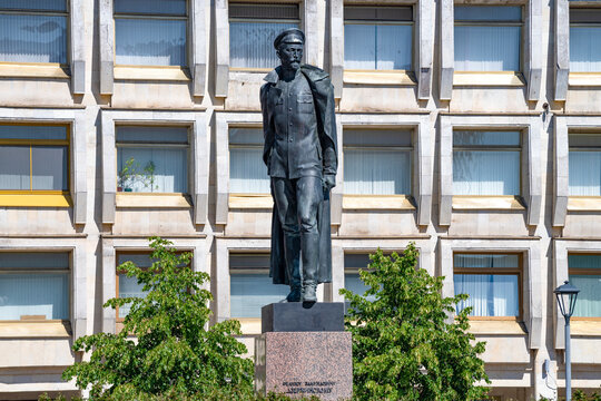 ST. PETERSBURG, RUSSIA - JULY 16, 2023: Monument to F.E. Dzerzhinsky against the background of the building of the Border Service of the FSB of Russia on a sunny summer day