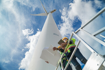 engineers working in fieldwork outdoors. Workers check and inspect construction and machine around...